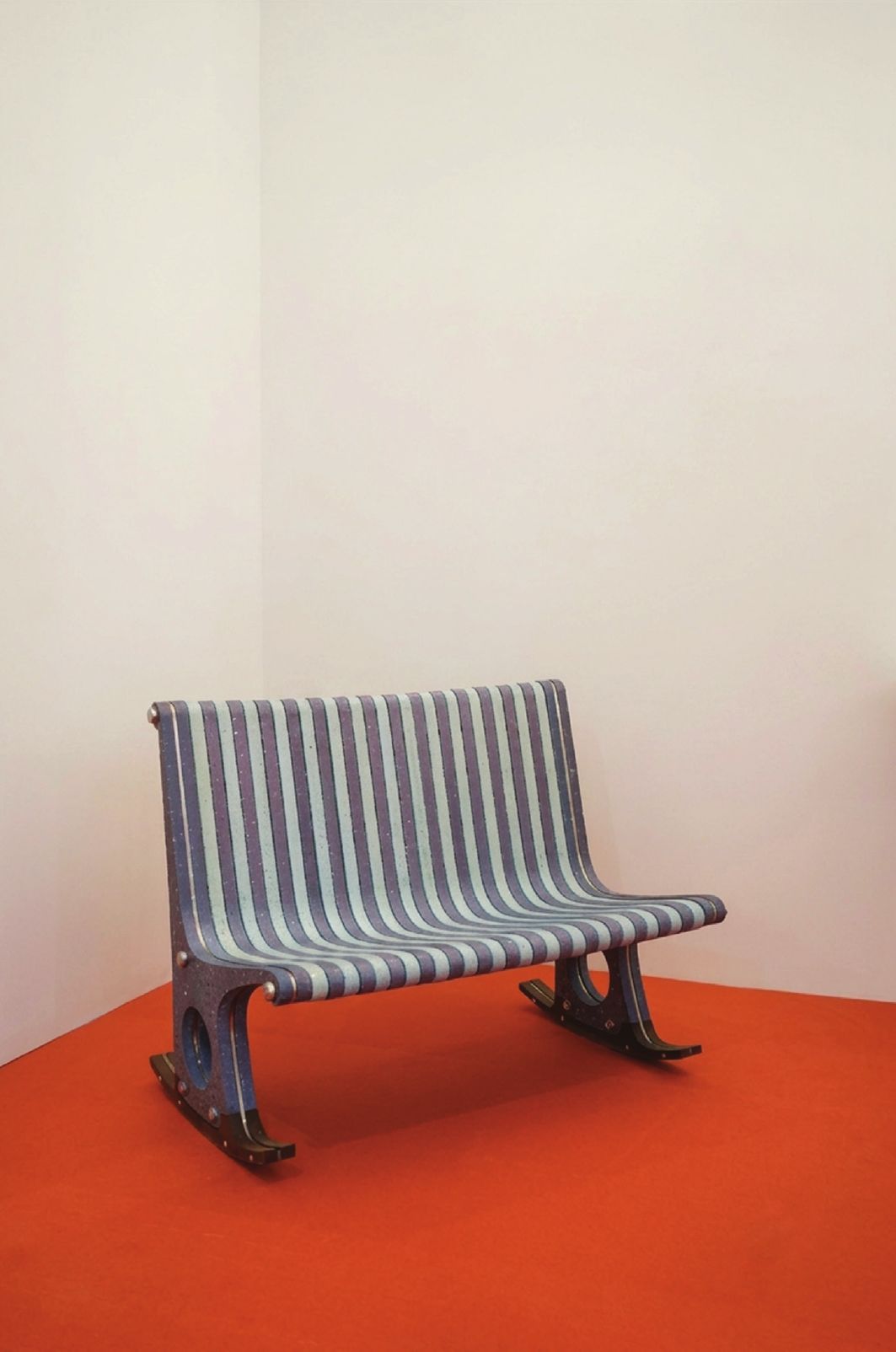 Moon and Back rocking bench: plum and blue striped concrete seat on teak rockers
